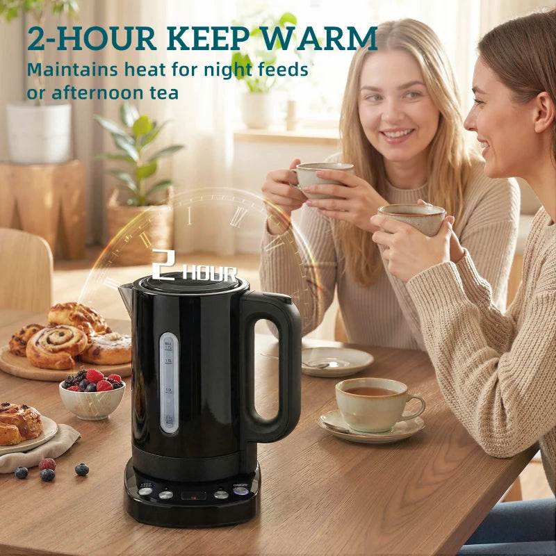 Black electric kettle on countertop beside mugs, with keep-warm control panel