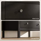 Black dresser drawer fronts with round metal knobs and elevated base