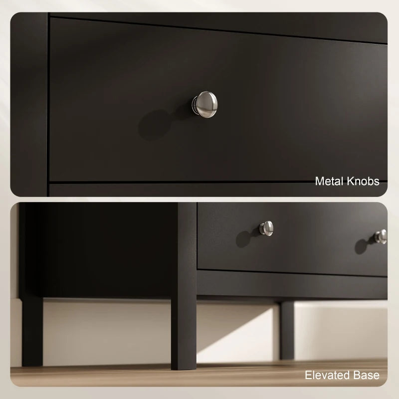Black dresser drawer fronts with round metal knobs and elevated base