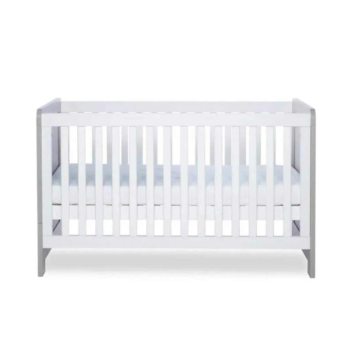 White cot bed showing interior slatted sides and lower support rail