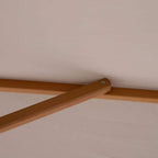 Wooden parasol frame joint with metal hardware and cross-brace support