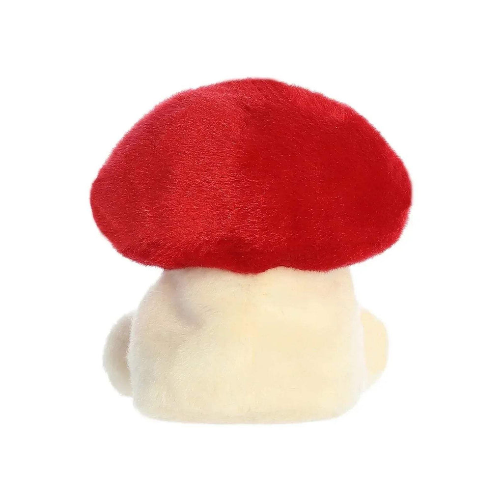 Red mushroom plush back view with rounded cap and cream underside