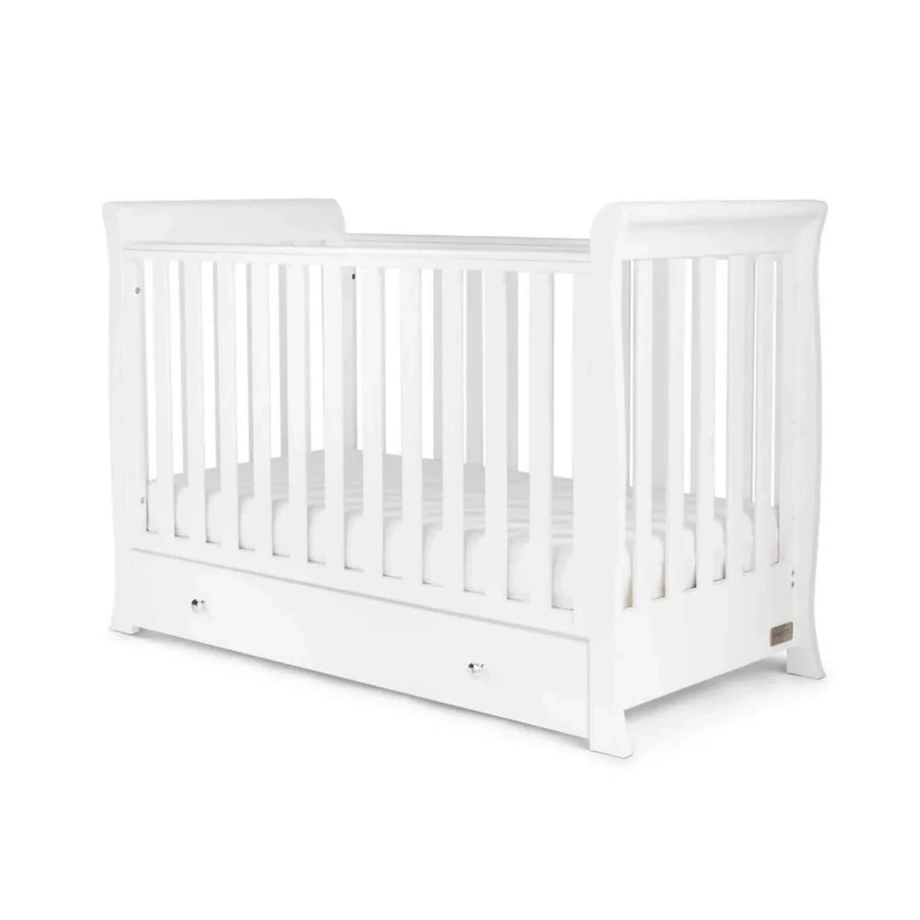 White mini cot bed with slatted headboard sides and front drawer panel