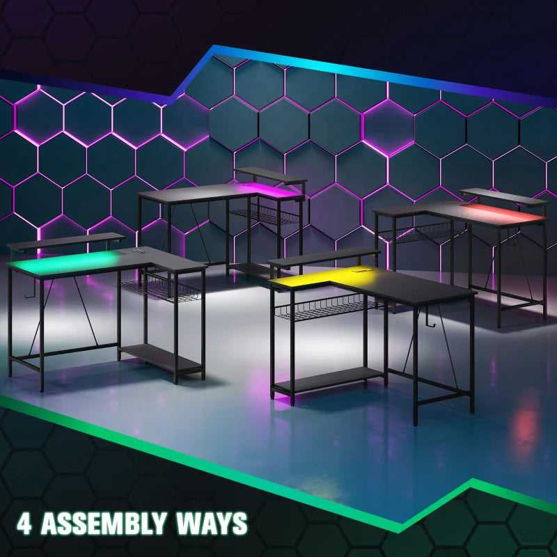 Black L-shaped gaming desks with multi-color LED lighting in a set