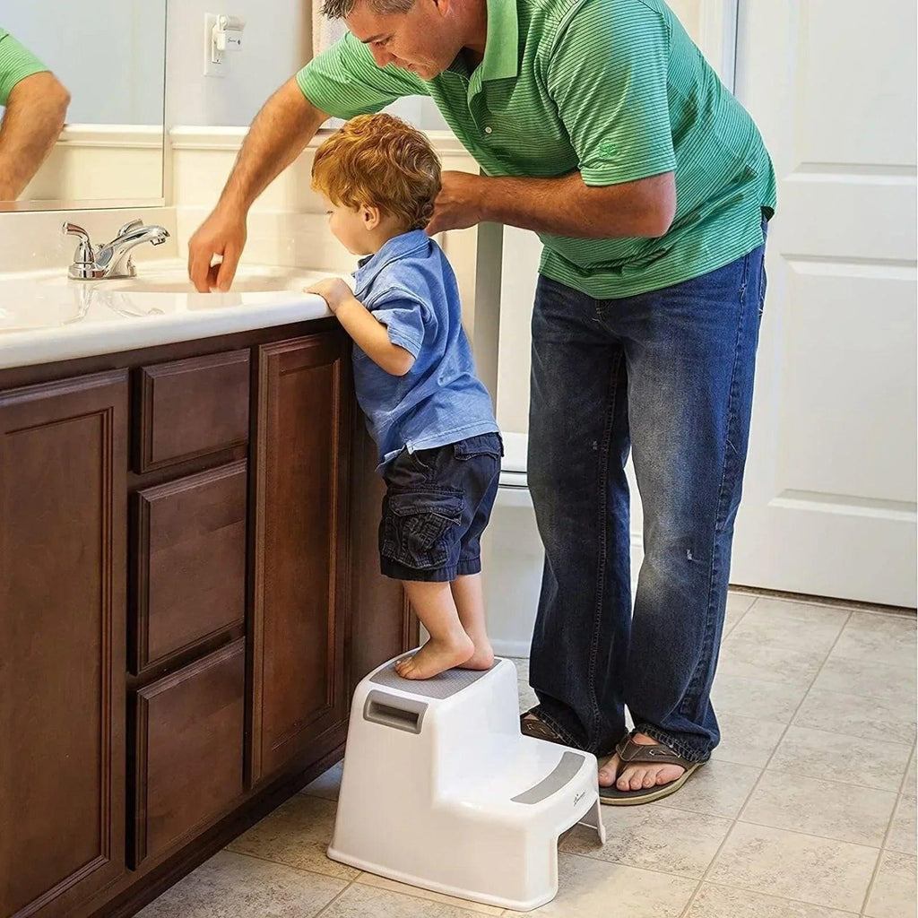 White two-step step stool with textured top platform and wide base