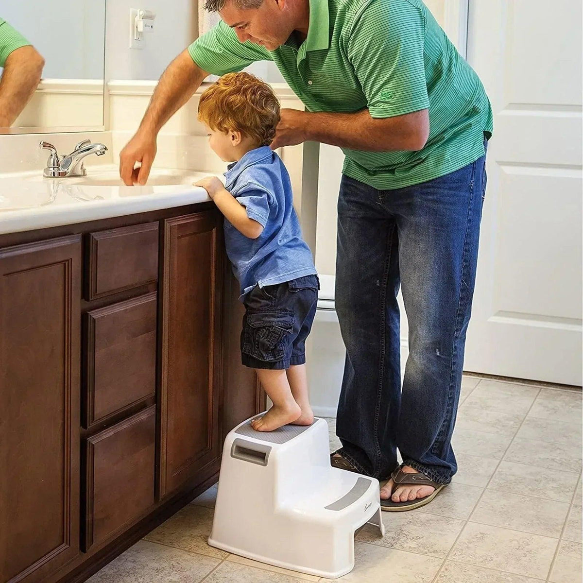 White two-step step stool with textured top platform and wide base