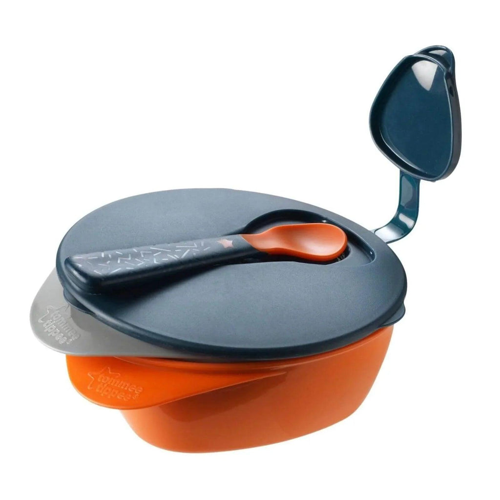Dark blue lid and spoon attached to orange baby feeding bowl