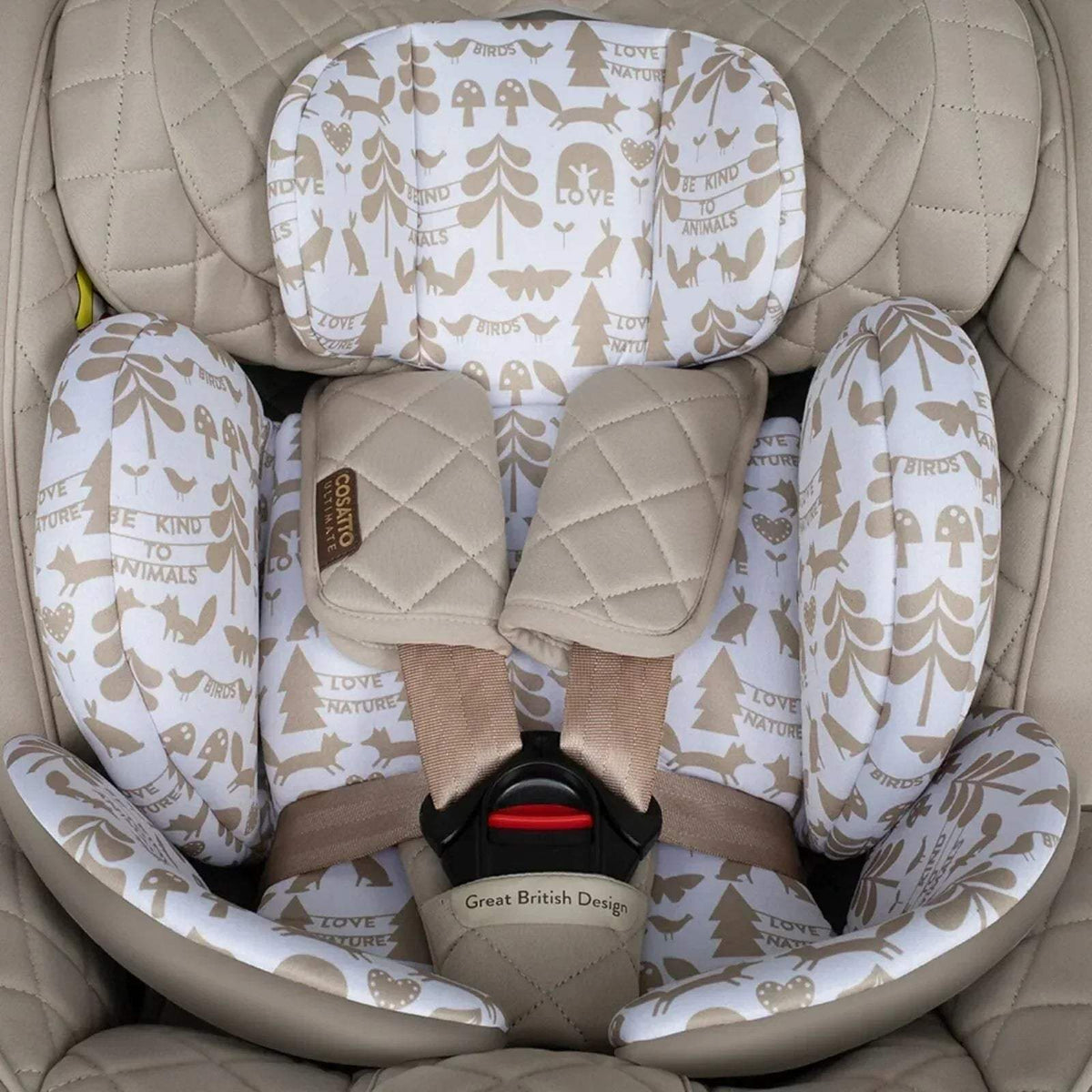 Car seat interior with beige quilting and animal-print seat pad, harness straps visible