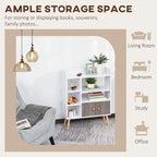 White bookcase with grey cabinet doors, open shelving, and wooden legs
