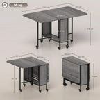 Grey drop-leaf dining table with black metal frame and caster wheels, dimensions shown