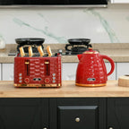 Red kettle and red 4-slice toaster on a kitchen counter