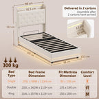 Cream single platform bed frame with tufted headboard and slatted base, open storage
