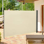 Cream outdoor privacy screen panel with dark gray end posts beside patio seating