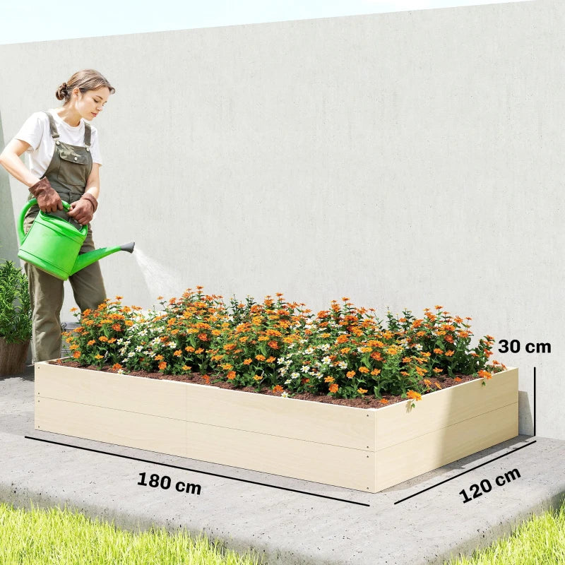Extra-large wooden raised garden bed planter box filled with orange and yellow flowers