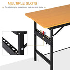 Work bench with orange MDF top and black frame, side tool slots and hook panel