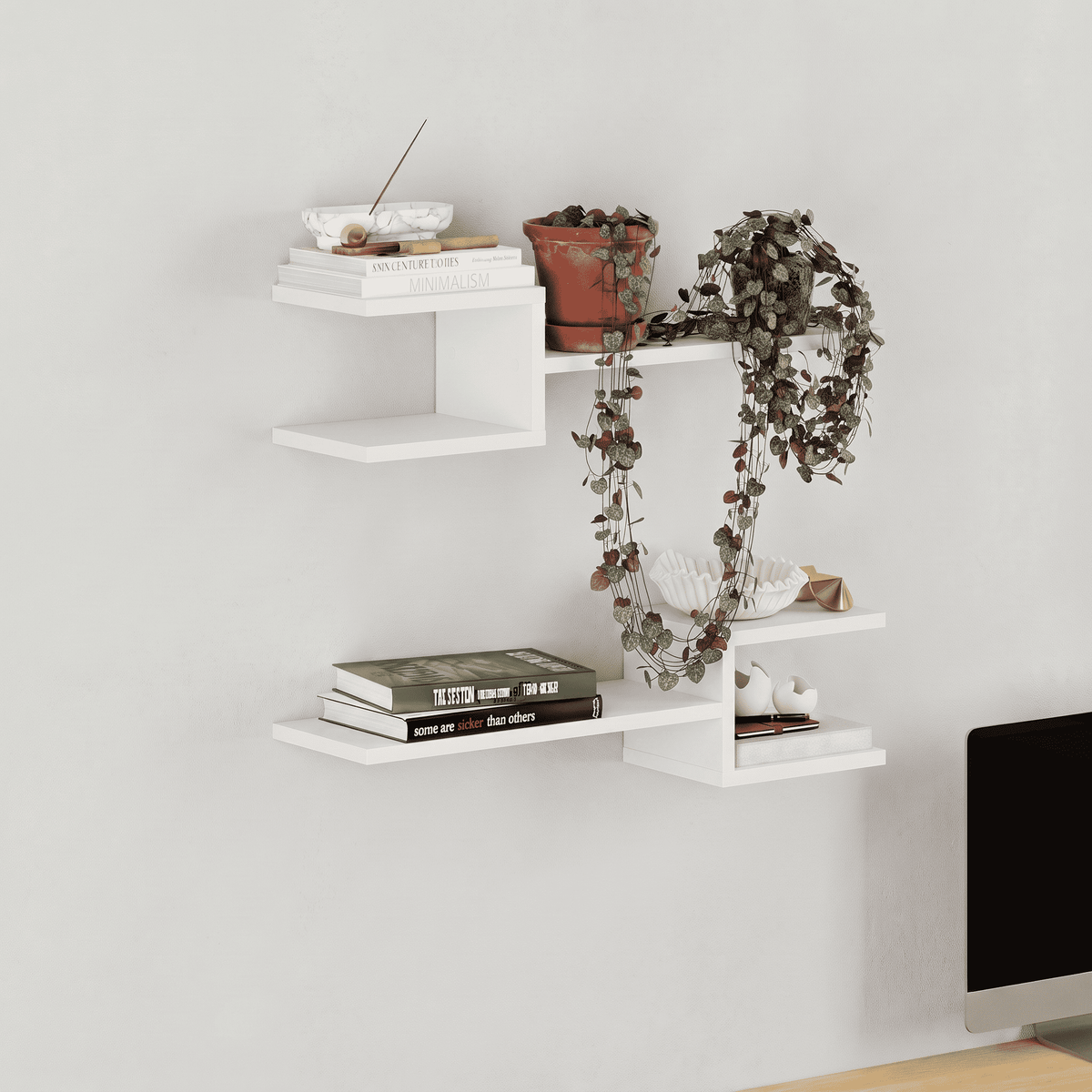 White wall-mounted floating shelf set with L-shaped ledges and open compartments