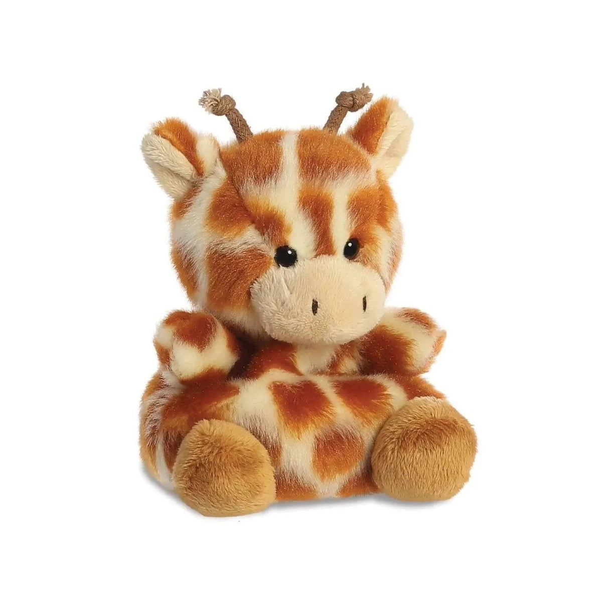 Giraffe plush toy lying down, brown-and-cream spots, small black eyes and stitched nose