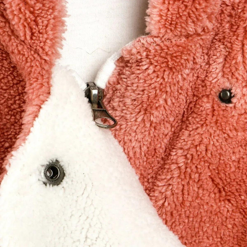 Front placket detail with zipper and snap, plush cream lining and terracotta fleece.