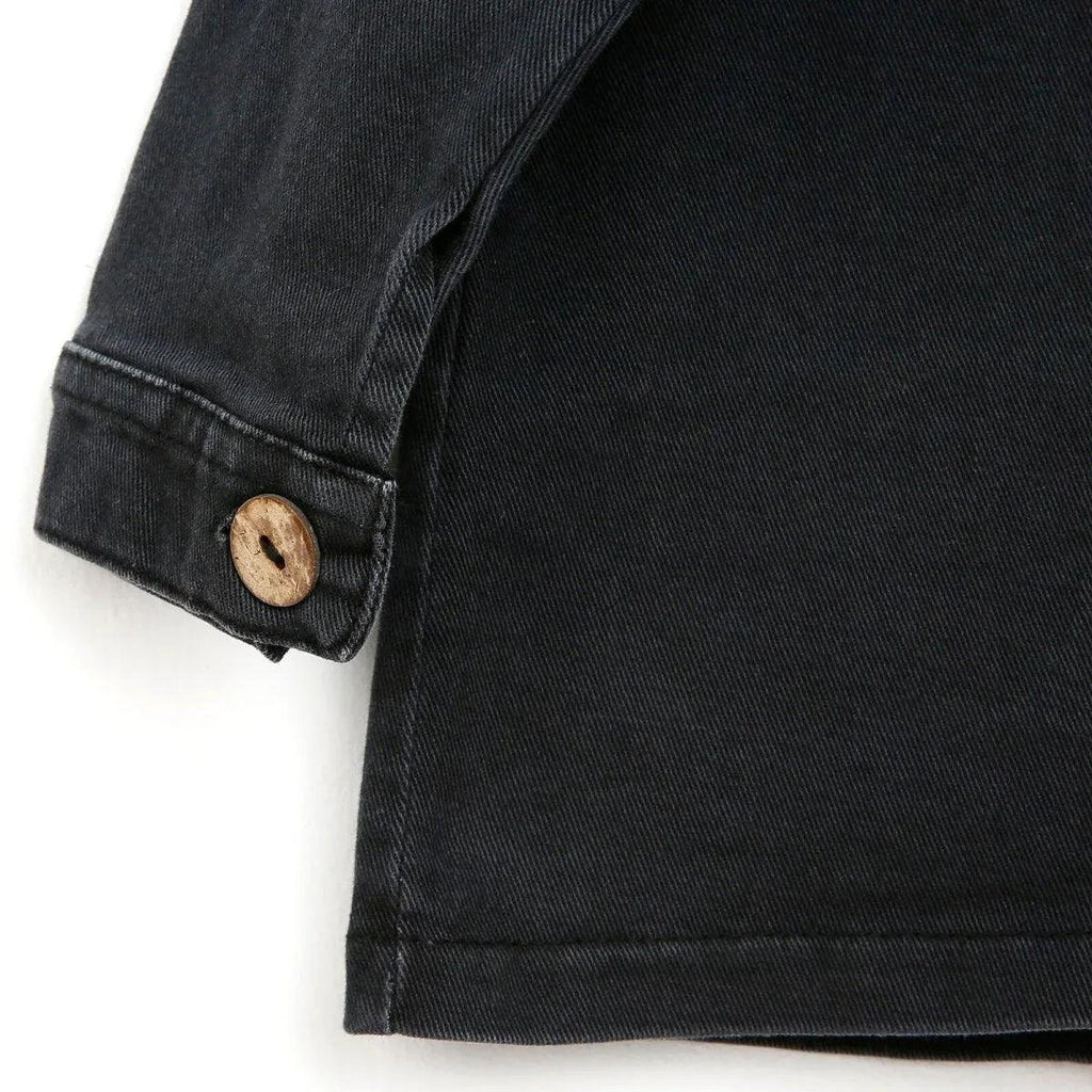 Dark anthracite baby jacket sleeve with button cuff and stitched hem