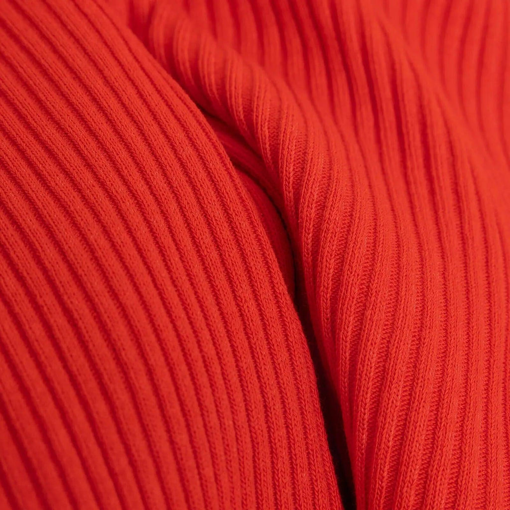 Orange rib-knit fabric with textured vertical rows