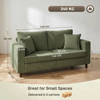Green corduroy 2-seater sofa with square arms and plush seat cushions
