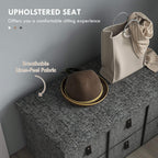 Dark grey upholstered padded top seat over six fabric shoe drawers