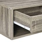 Grey wood-effect bedside table corner with drawer front and open shelf interior