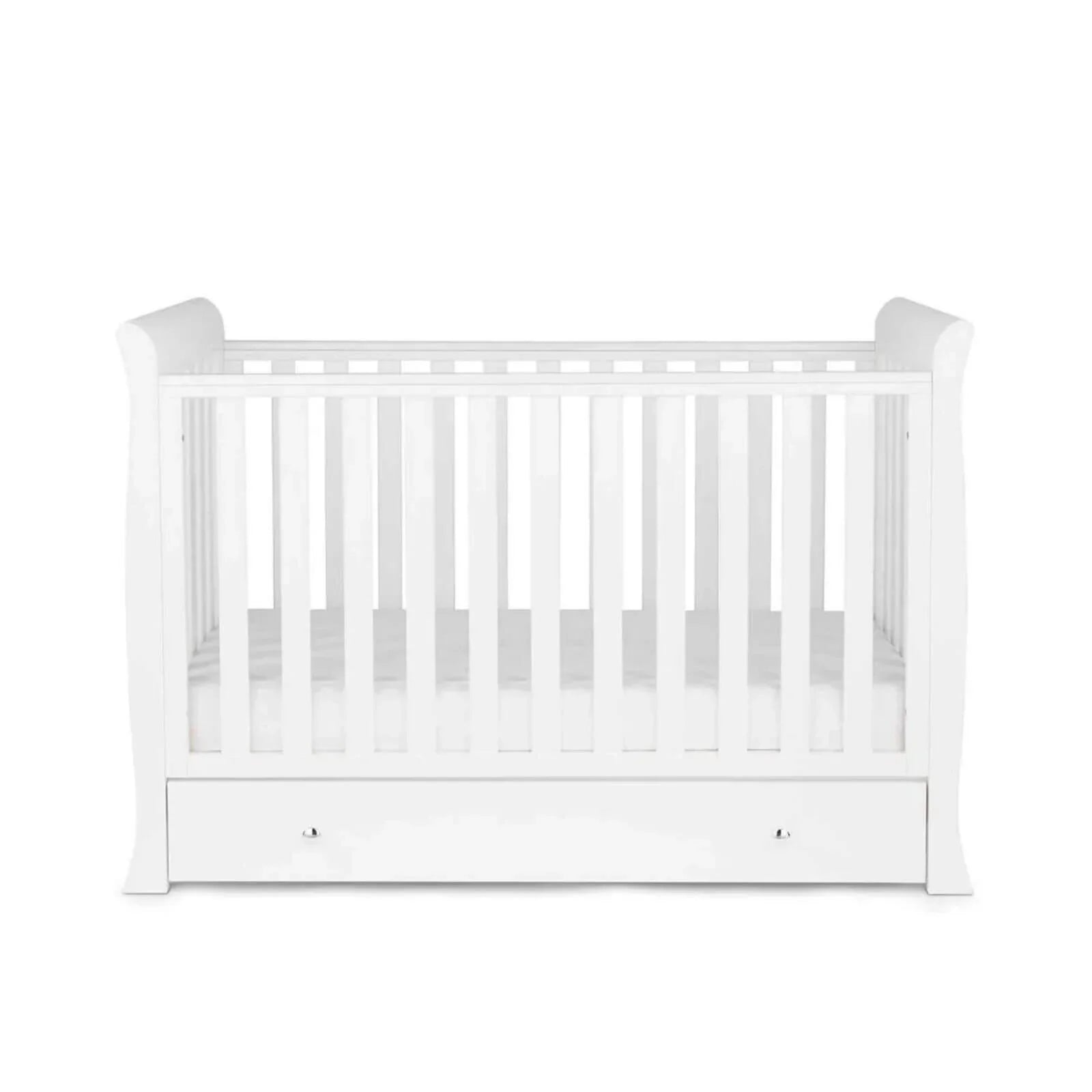 White mini cot bed with vertical slat rails and open crib interior