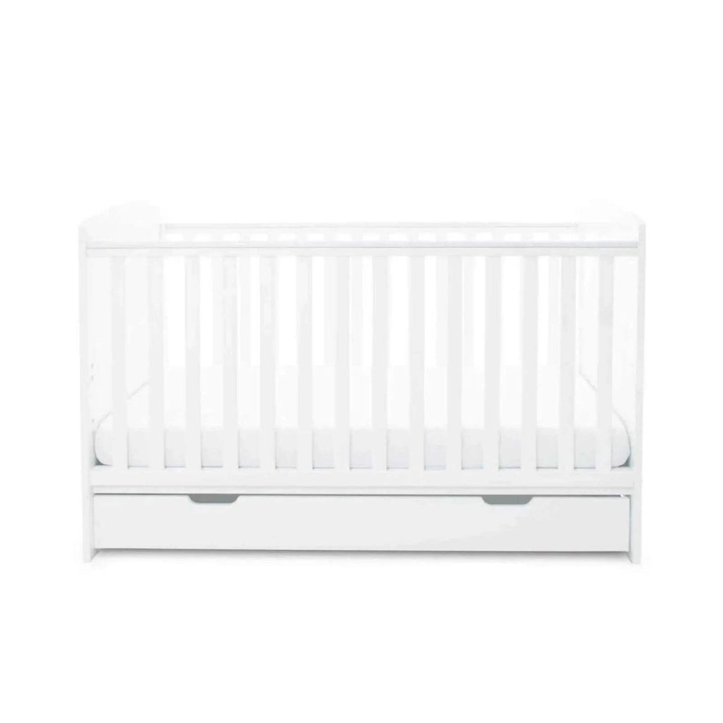 White cot bed front with vertical slats and under-drawer section