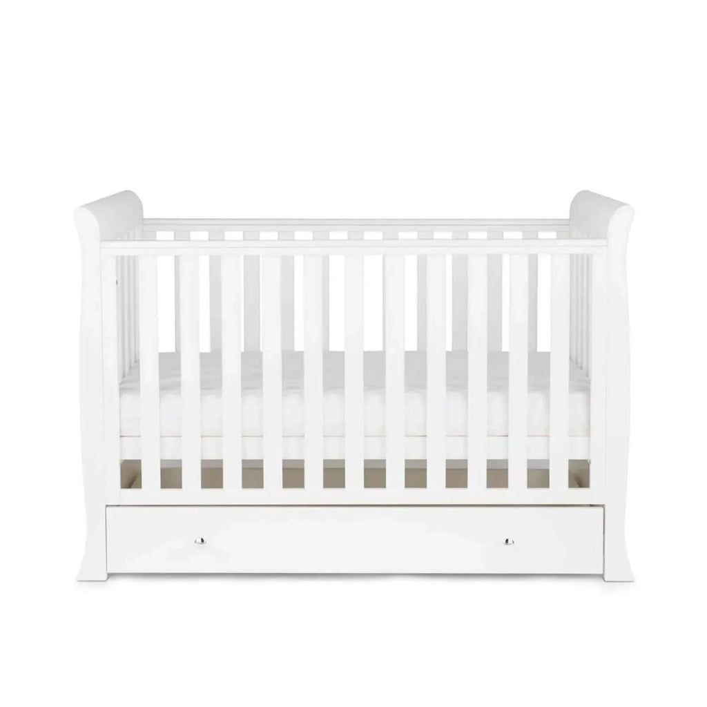White mini cot bed with vertical slat rails and front drawer panel