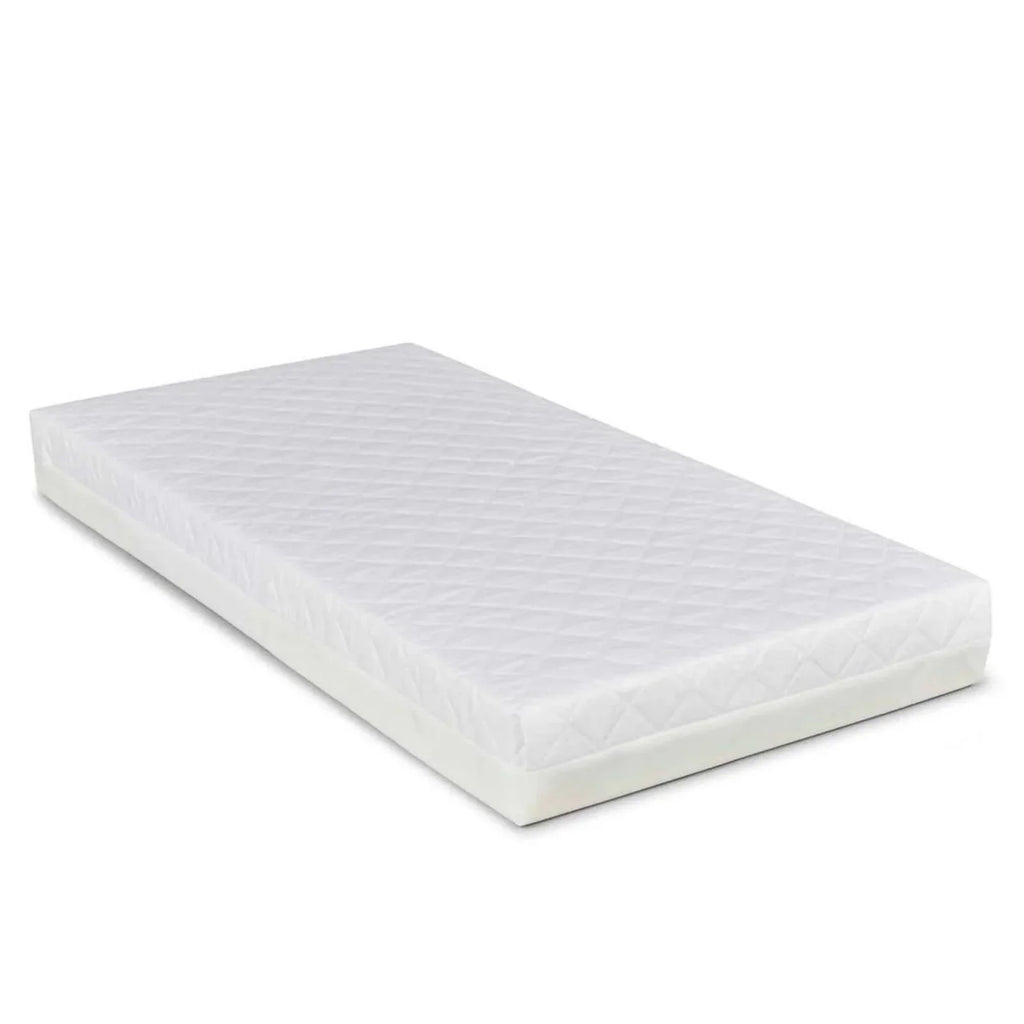 White quilted mattress for a mini cot