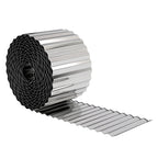Silver corrugated galvanized steel edging roll with serrated top edge, coiled for installation