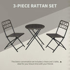 3-piece rattan bistro set featuring round dark grey table and two folding chairs