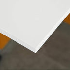 White tabletop corner with smooth edge and clean seam detail