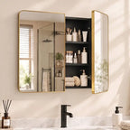 Gold-tone bathroom mirror cabinet with open mirrored door revealing bottles and shelves