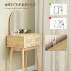 Natural wood vanity desk with anti-tip wall strap behind the two drawers