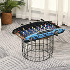 Blue mini foosball tabletop game with player rods and foosball figures on black frame