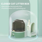 Green enclosed cat litter box with closed dome cover and side ramp access