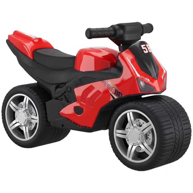 Red and black toddler balance bike with wide wheels, padded seat, and handlebar grips