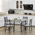 Grey marble-effect dining table set with four black chairs