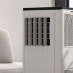White portable air conditioner close-up of front louvers and grille