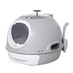 Grey enclosed cat litter box with front entry, top exit, and side scoop holder