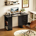 Black computer desk with open shelves and three drawers on the side