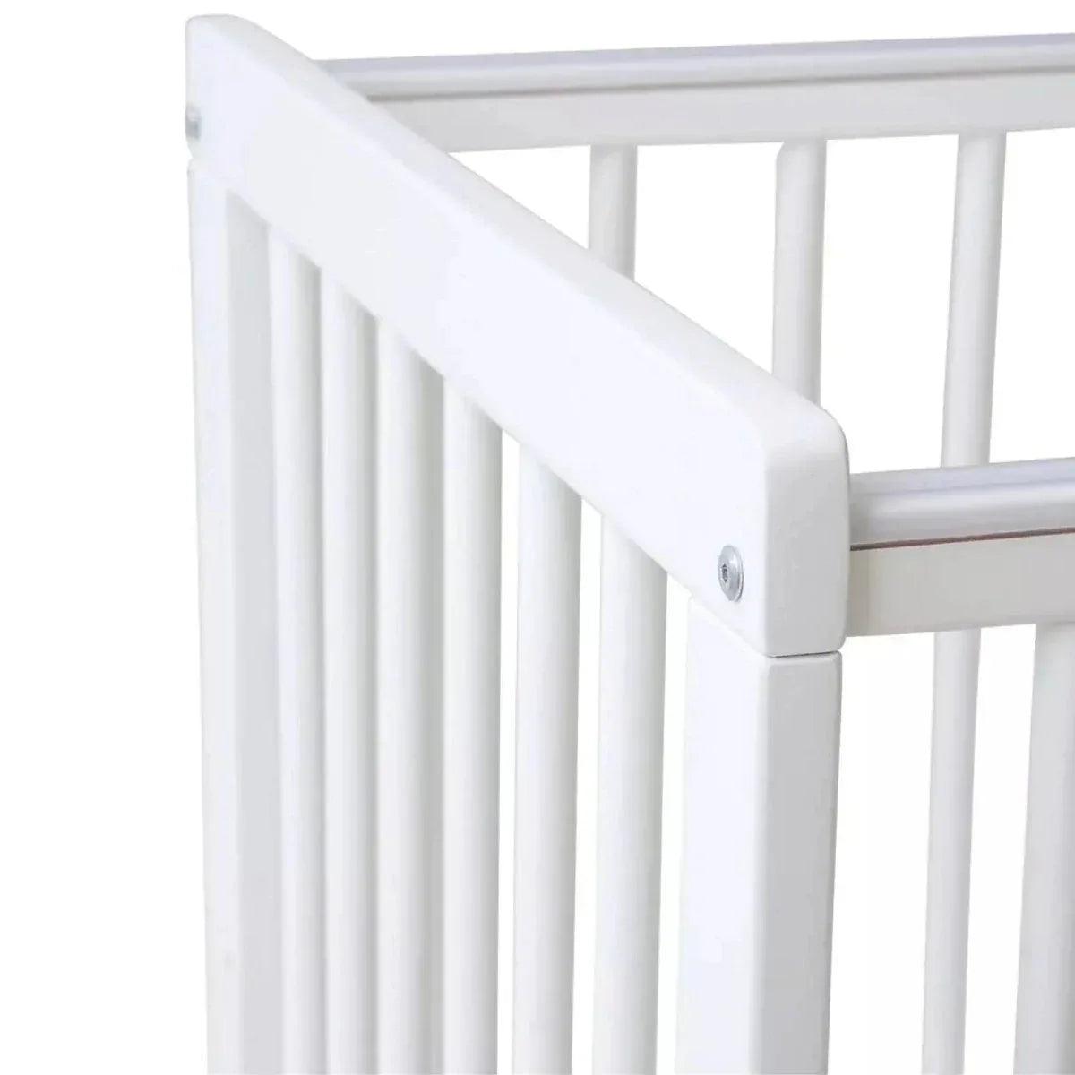 White cot corner with rounded end rail and vertical slat panel