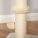 Beige sisal scratching post with hanging pom-pom ball on cat tree