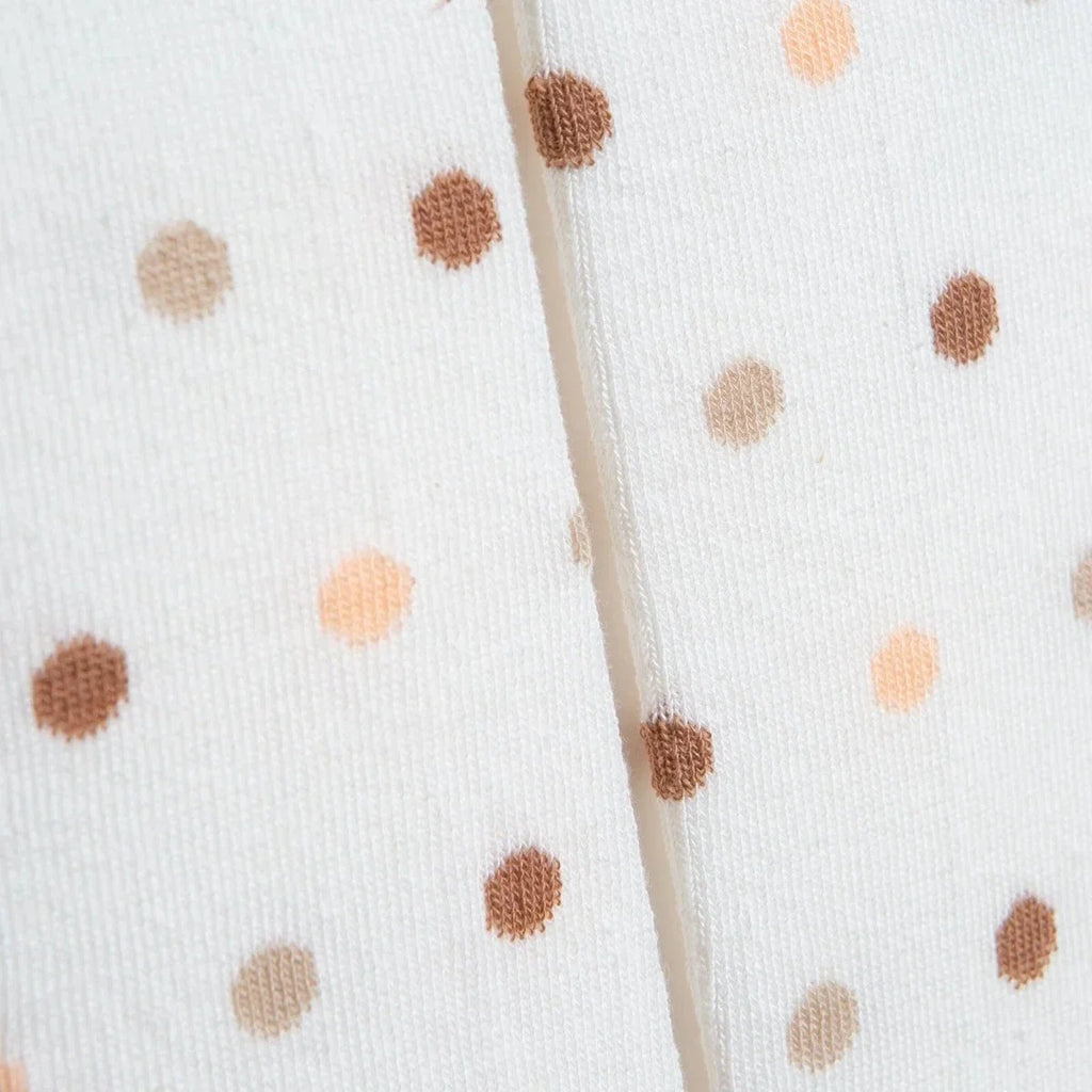 Girls polka dot tights close-up of seam and beige/brown dot print
