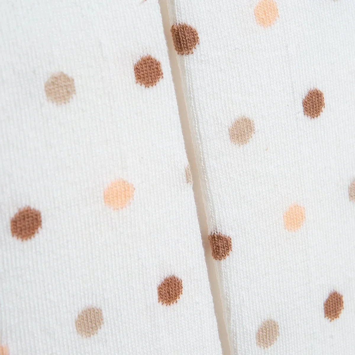 Girls polka dot tights close-up of seam and beige/brown dot print