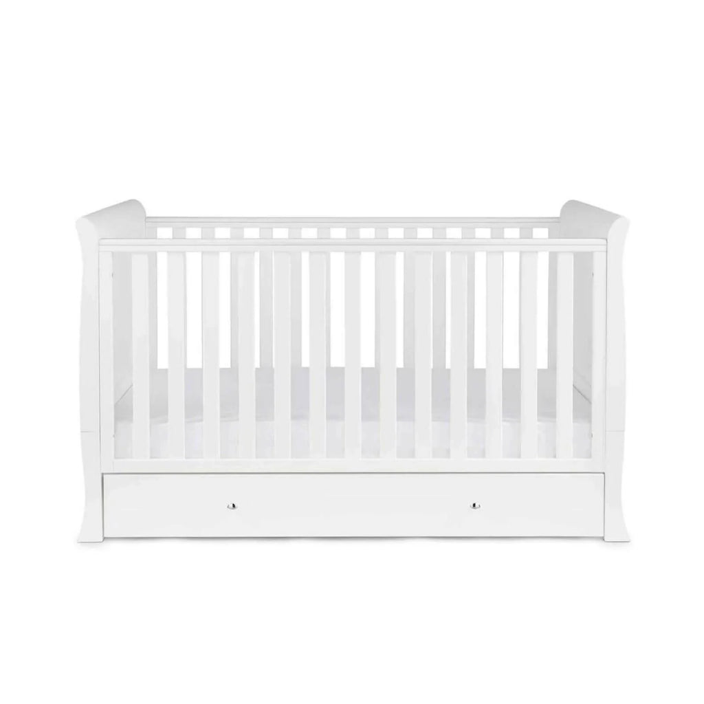 White wooden baby cot with vertical rail fence and drawer base, front view