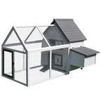 White wooden chicken coop with wire-mesh run and dark grey roof panels