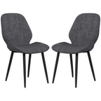 Pair of grey velvet dining chairs with curved backs and black metal legs